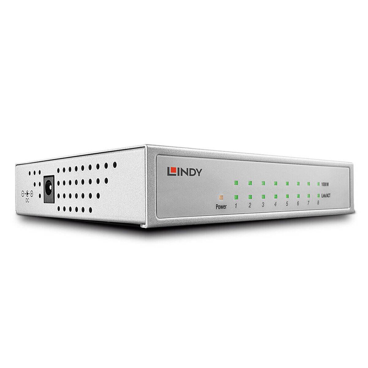 Ein silberner Netzwerk-Switch mit LED-Anzeigen für Stromversorgung und acht Ethernet-Ports auf dem Frontpanel. Das Markenlogo 'Lindy' ist sichtbar.