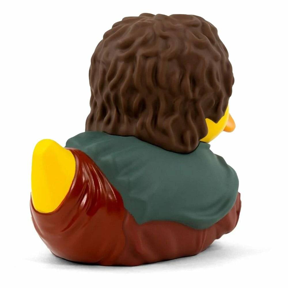 Eine Spielfigur von hinten betrachtet, mit lockigem braunem Haar und gekleidet in einen grünen Umhang und ein braunes Gewand, die einer Fantasyfigur ähnelt.