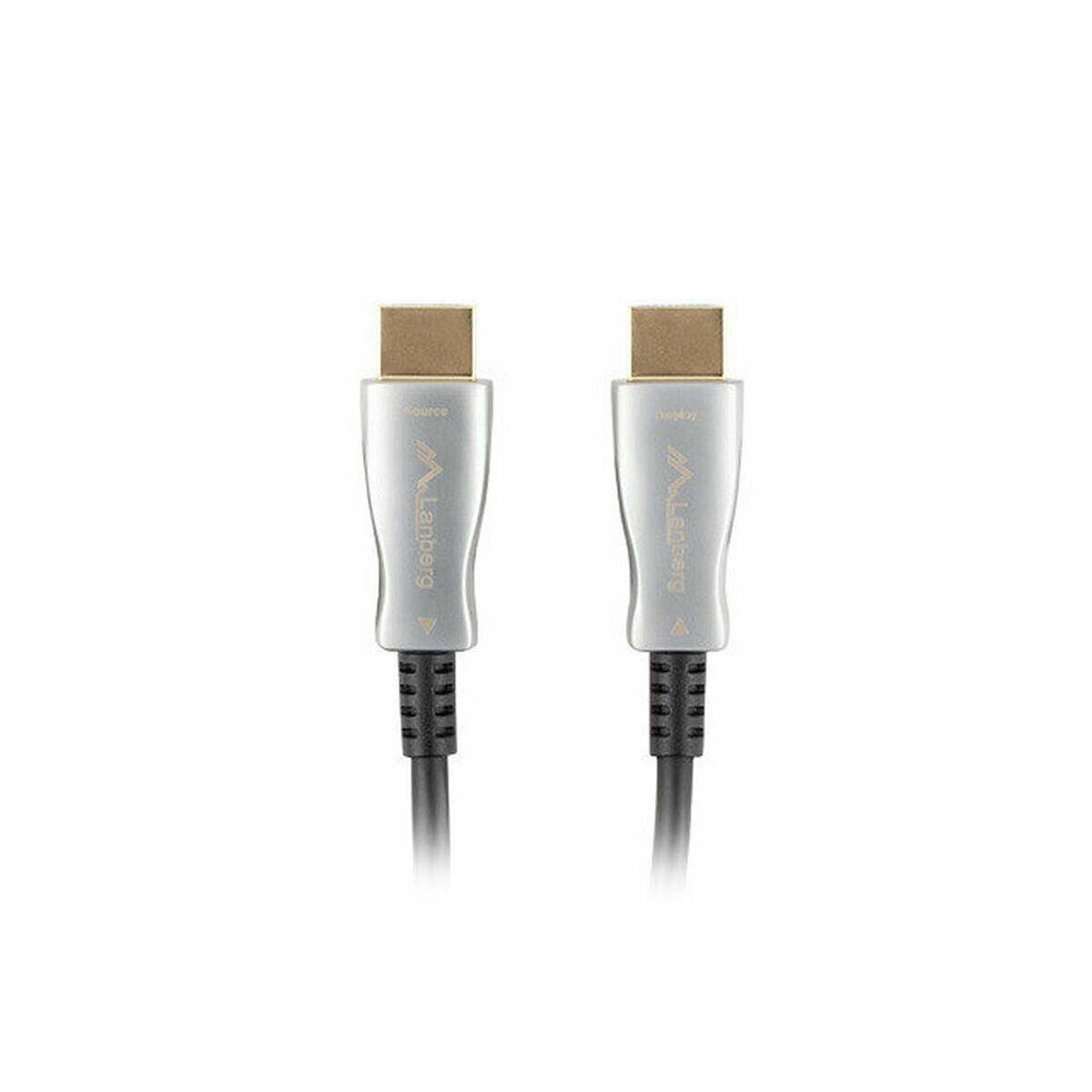 Zwei HDMI-Kabel mit goldenen Anschlüssen und schwarzen Kabeln vor einem weißen Hintergrund, parallel zueinander positioniert.