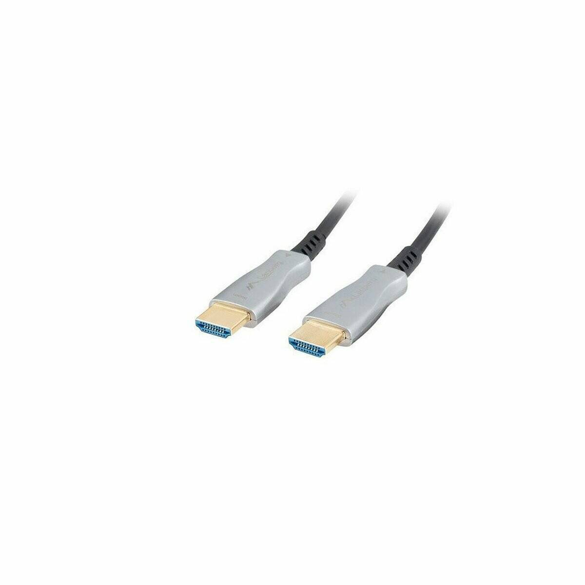 Zwei HDMI-Kabelanschlüsse, einer in grau und einer in goldfarben, mit angeschlossenen schwarzen Kabeln, vor einem weißen Hintergrund isoliert.