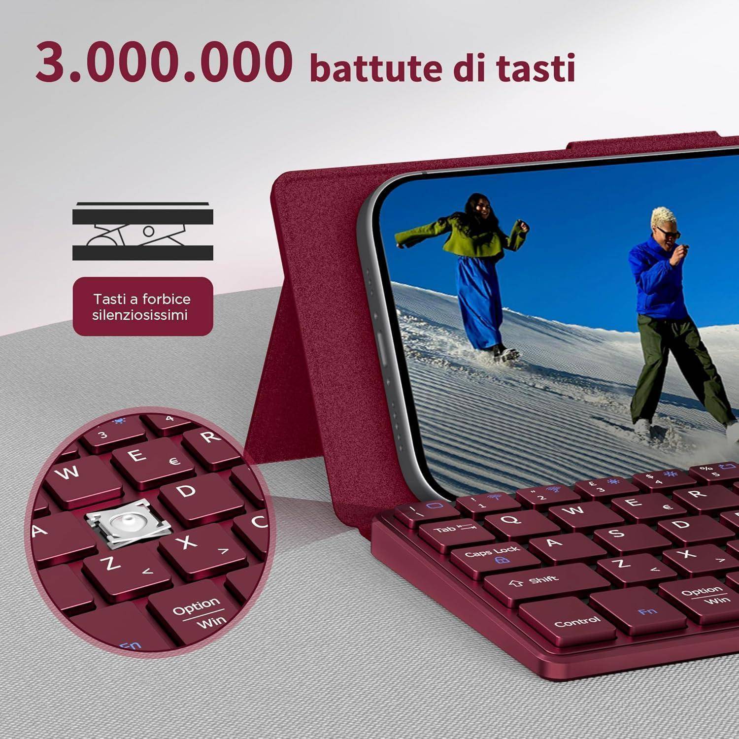 Ein Tablet mit einer Tastaturhülle zeigt zwei Menschen beim Skifahren. Der Text lautet 