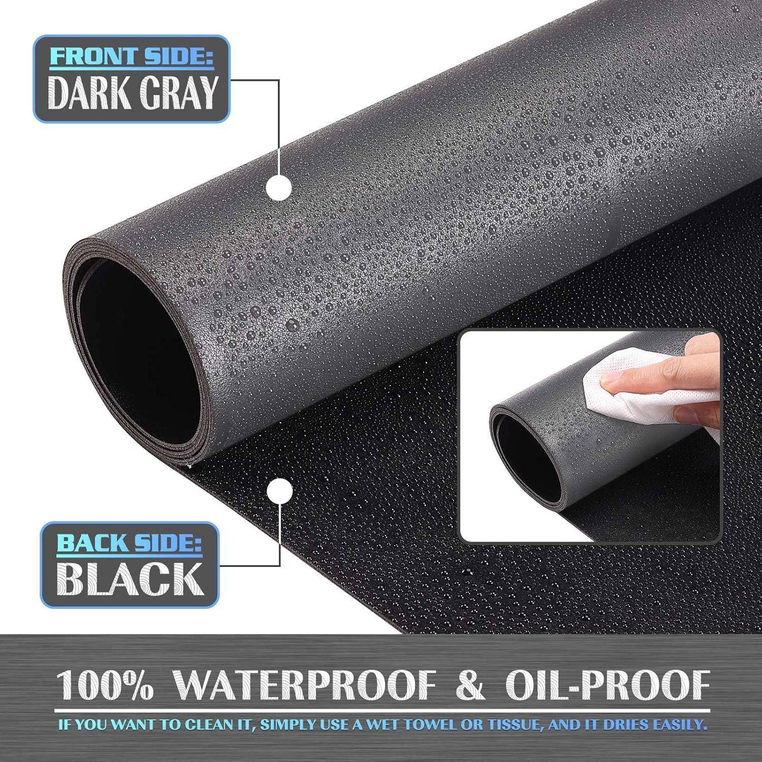 Rolle aus wasserundurchlässigem und ölabweisendem Material, Vorderseite in dunkelgrau, Rückseite in schwarz. Nahaufnahme zeigt Wasser auf der Oberfläche. Text: '100% Wasserdicht & Ölabweisend'.