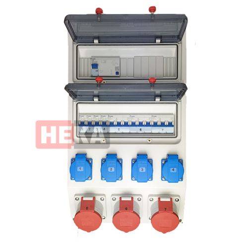 Eine elektrische Schaltanlage mit mehreren blauen und roten Steckdosen und Schaltern. Das Wort 'HEVA' ist in Rot sichtbar.