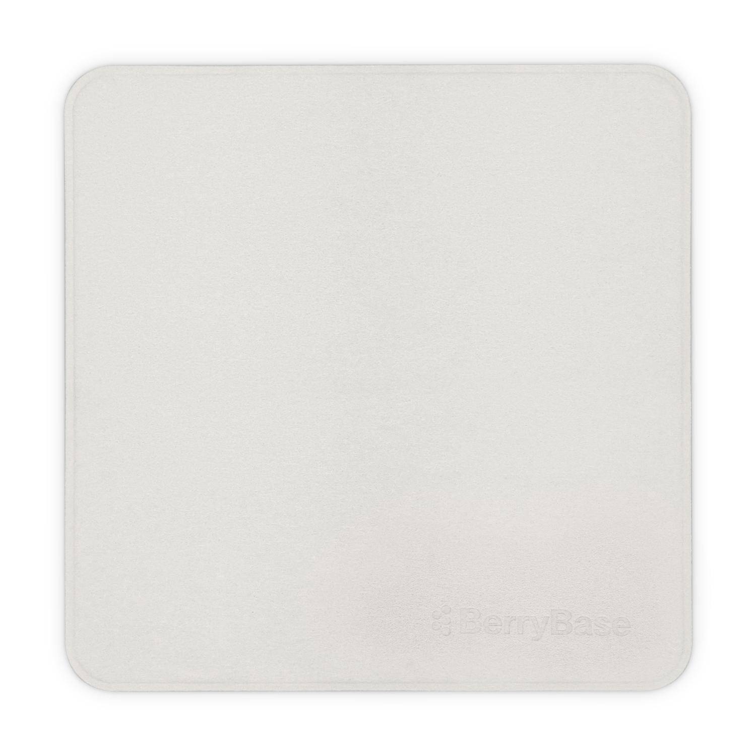 Ein einfacher, quadratischer, cremefarbener Untersetzer mit abgerundeten Kanten und einem geprägten „PennyBase