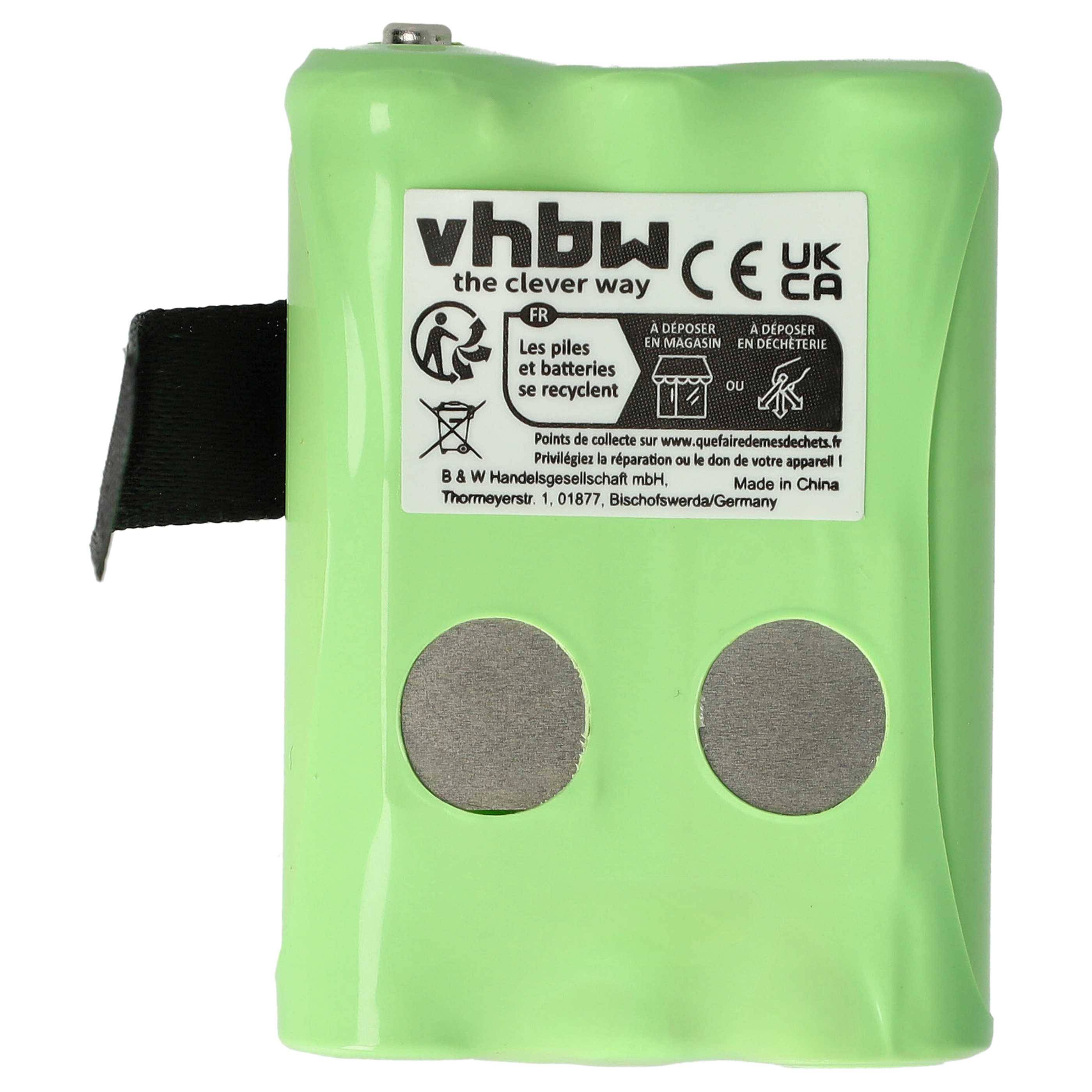 Eine grüne rechteckige Batterieverpackung mit zwei runden Anschlüssen, gekennzeichnet mit 'vhbw'. Der Text enthält Recyclinginformationen in mehreren Sprachen.