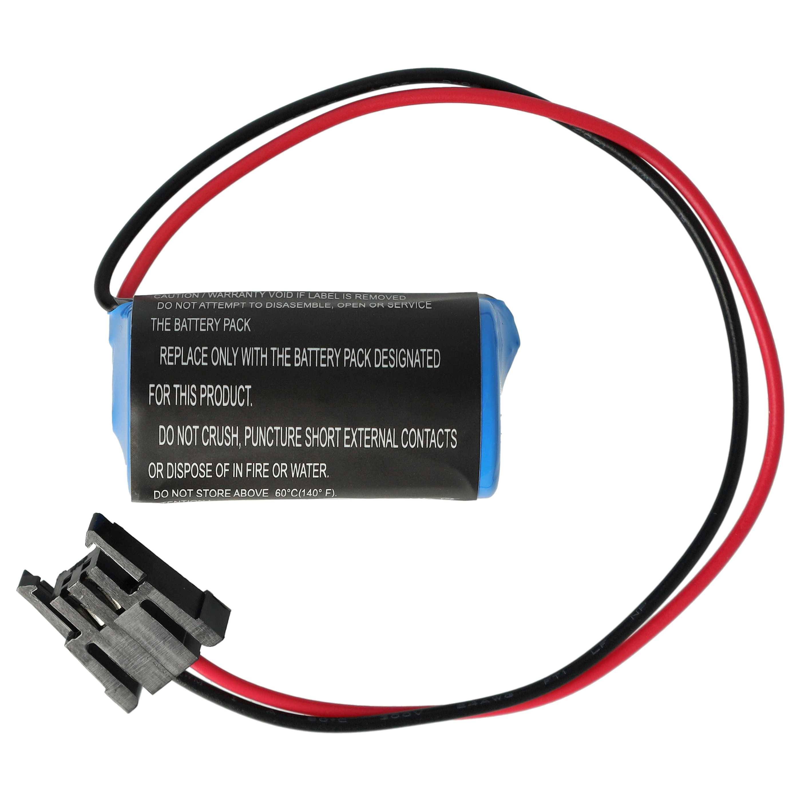 Eine kleine, zylindrische Batterieverpackung mit schwarzen und roten Kabeln, die mit Gebrauchs- und Sicherheitshinweisen beschriftet ist.