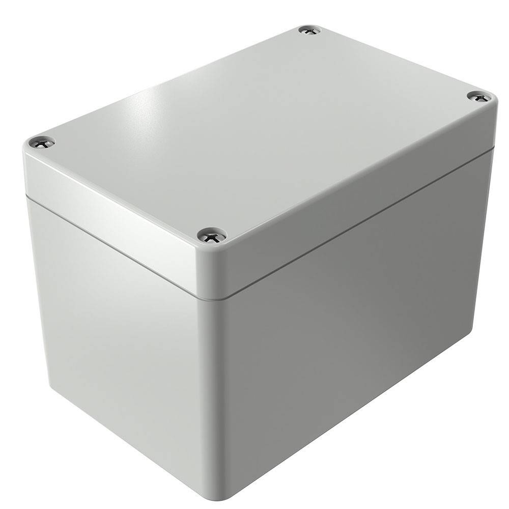 Eine rechteckige graue Schachtel mit vier Schrauben an den Ecken ihrer Oberseite, aus einem Winkel betrachtet.