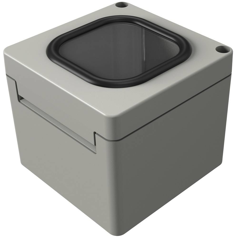 Eine graue, würfelförmige Box mit einem kreisrunden schwarzen Deckel oben. Sie scheint ein Behälter oder eine Aufbewahrungseinheit zu sein, aus einer leicht geneigten Perspektive betrachtet.