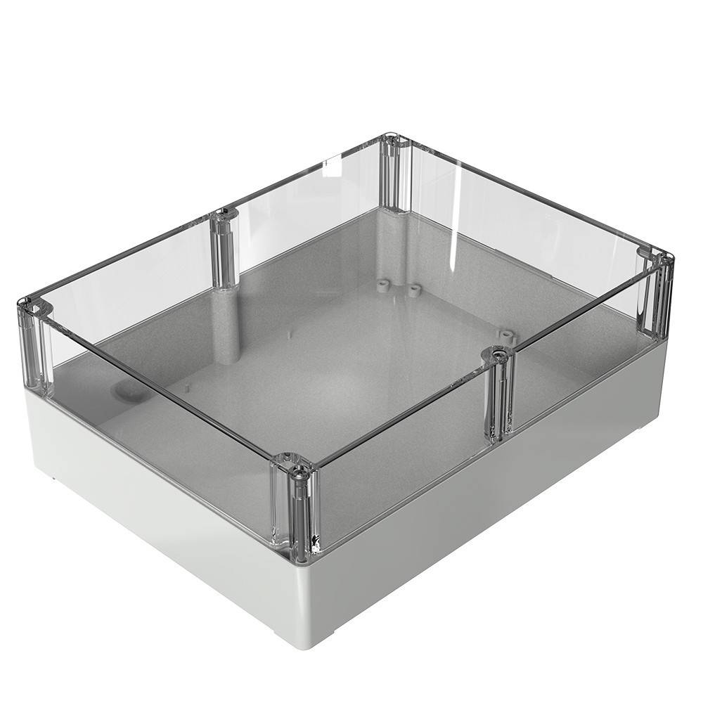 Eine transparente Schutzumhüllung mit einem durchsichtigen Deckel und einer soliden, grauen Basis, möglicherweise zum Schutz von elektronischen Bauteilen oder Geräten verwendet.