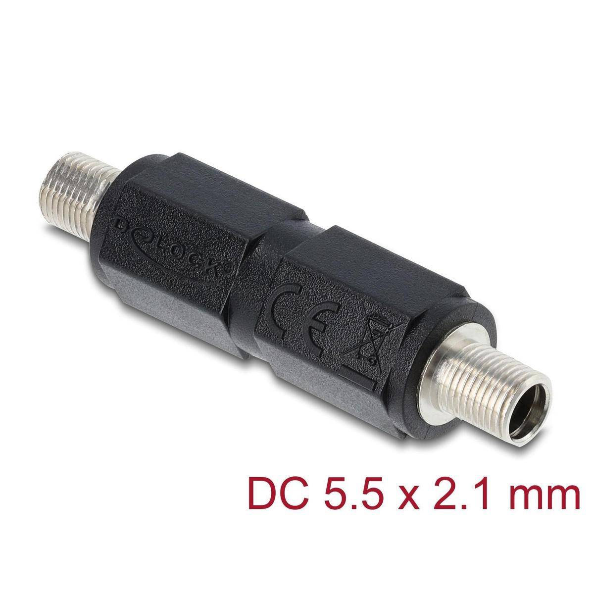 Ein zylindrischer Adapter mit einem schwarzen Mittelteil und metallischen Enden. Text darunter liest sich 