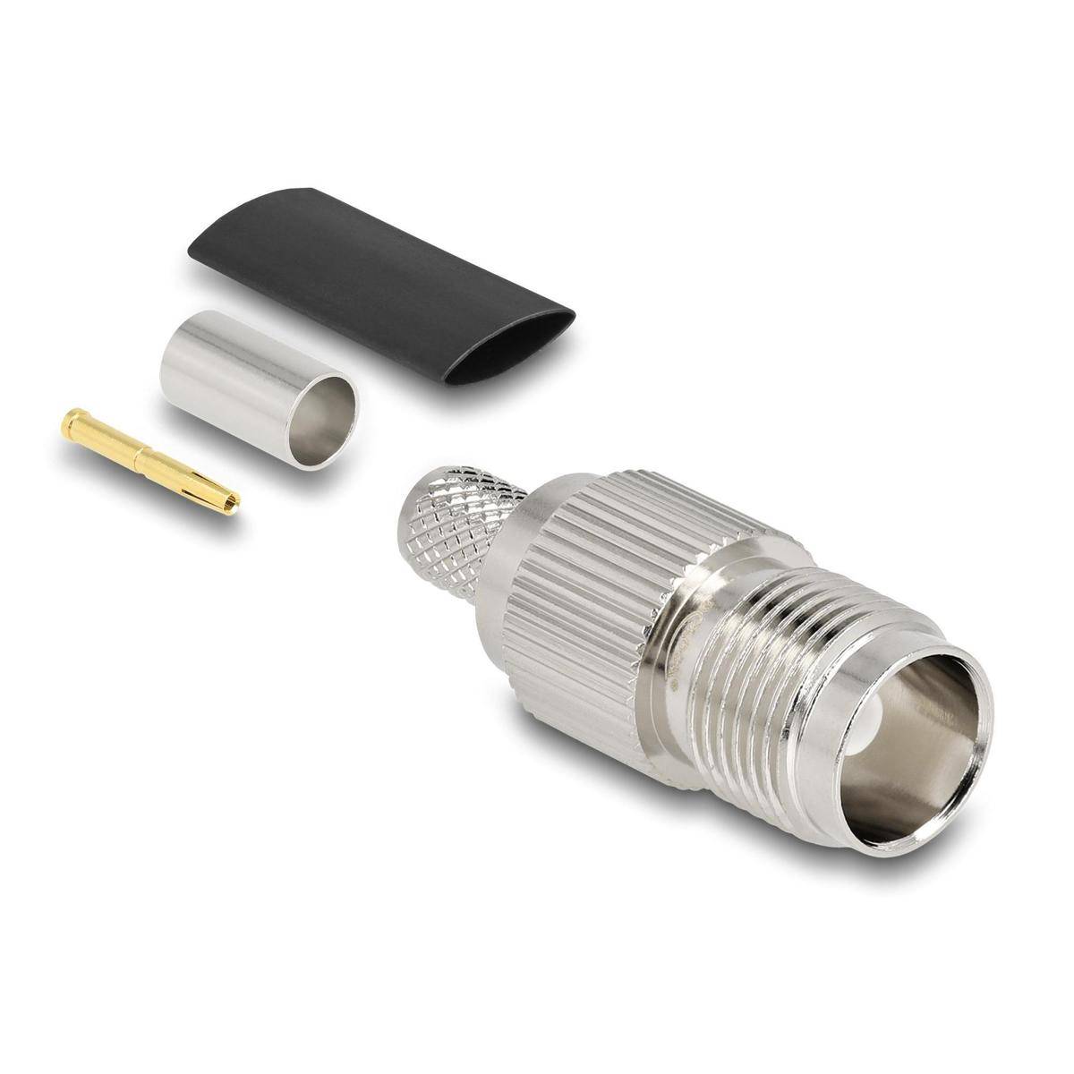 RF-Koaxialverbindungssatz mit drei Komponenten: Stecker, Metallrohr, Goldpin und schwarzer Schrumpfschlauch, verwendet in Kabelanschlüssen.