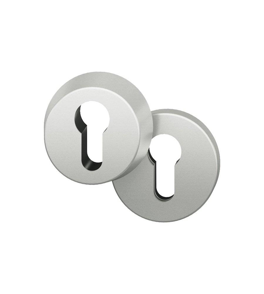 Zwei kreisförmige, metallische Schlüssellochabdeckungen mit minimalistischem Design, wobei die eine leicht die andere überlappt.