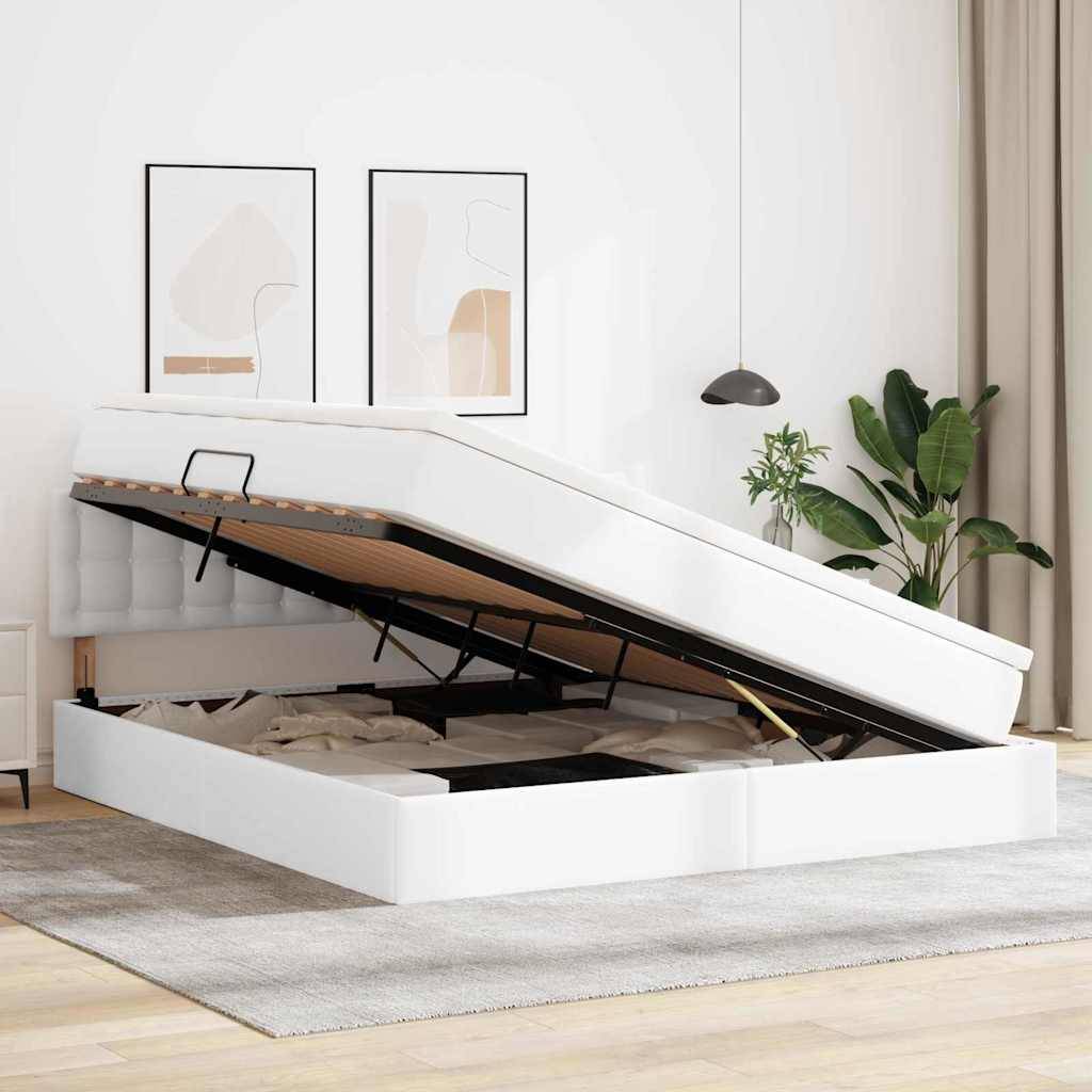 Ein modernes Bett mit angehobener Matratze, das darunter Stauraum offenbart. Das Zimmer zeichnet sich durch minimalistische Einrichtung mit Pflanzen und gerahmter Kunst aus.