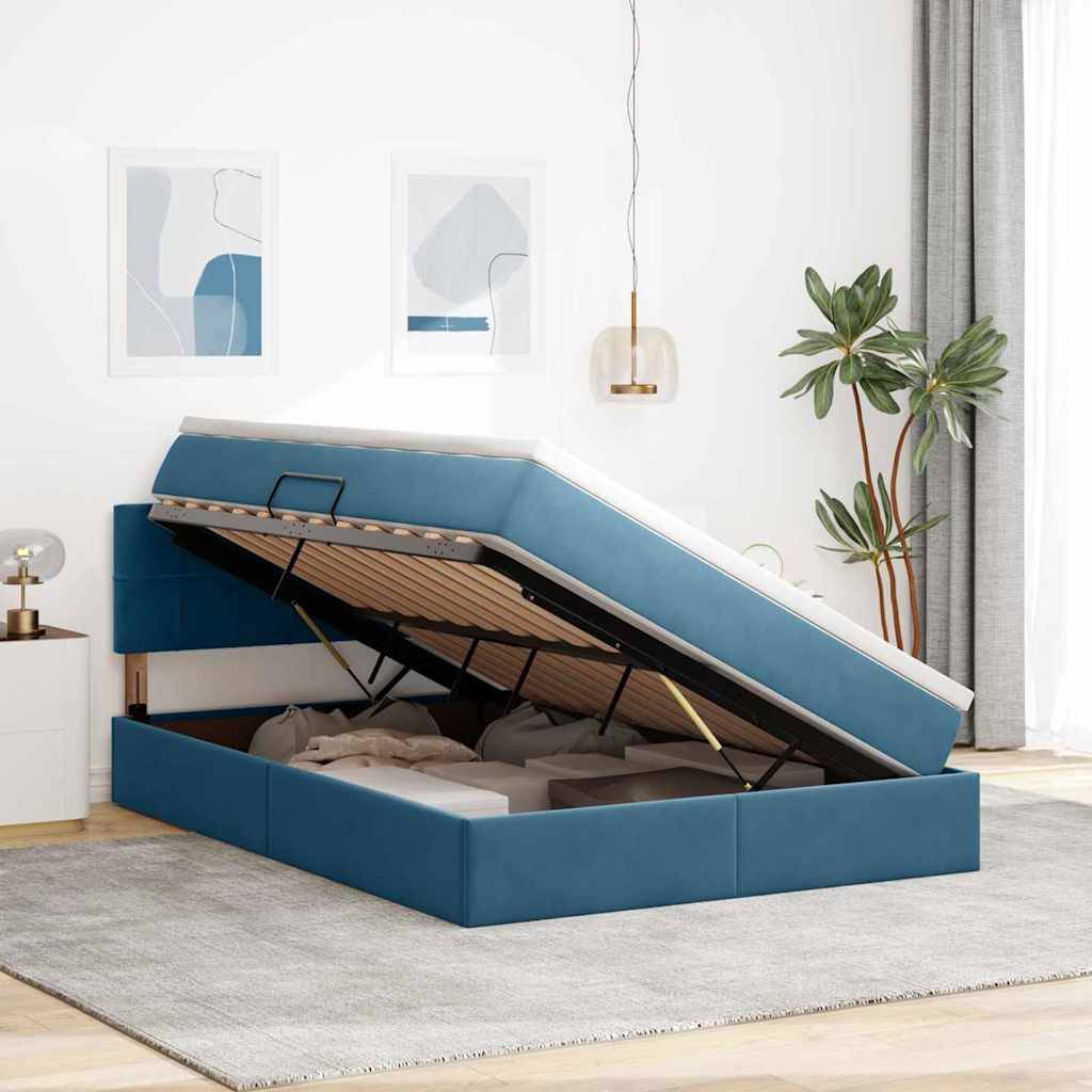 Ein blaues Stauraumbett in einem modernen Schlafzimmer mit geöffnetem Deckel, der Gegenstände im Inneren zeigt. Der Raum verfügt über abstrakte Kunst und eine Topfpflanze.