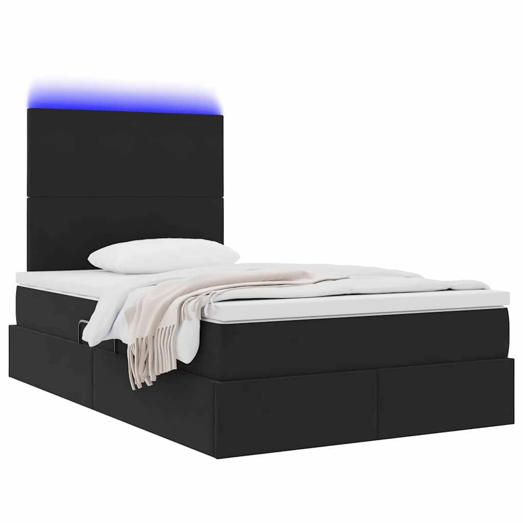 Ein modernes schwarzes Plattformbett mit einem hohen Kopfteil, das eine blaue LED-Beleuchtung aufweist. Das Bett ist mit weißer Bettwäsche und einer beigen Decke bezogen.