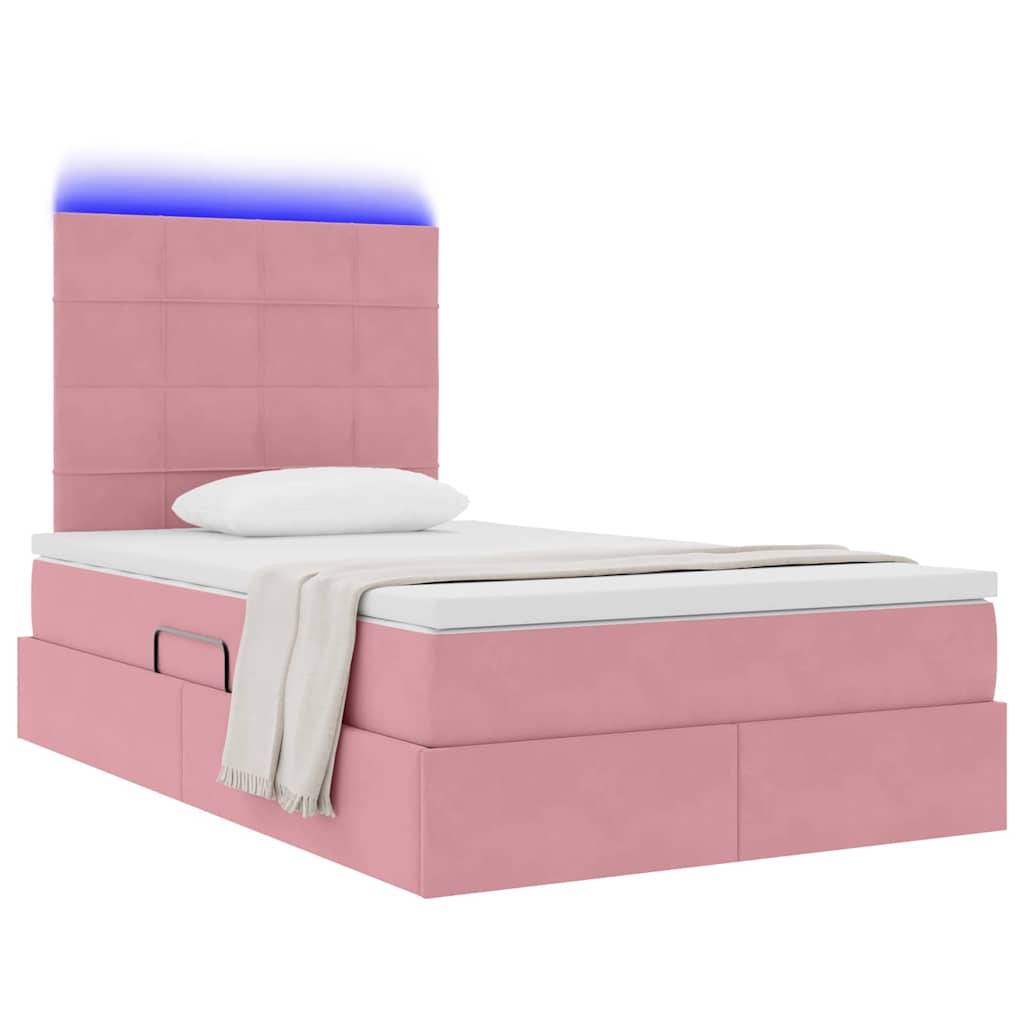 Ein Bett mit rosa Polsterung und hohem Kopfteil verfügt über eingebaute Schubladen für Stauraum und blaue LED-Beleuchtung. Ein weißes Kissen und eine weiße Decke sind im Lieferumfang enthalten.