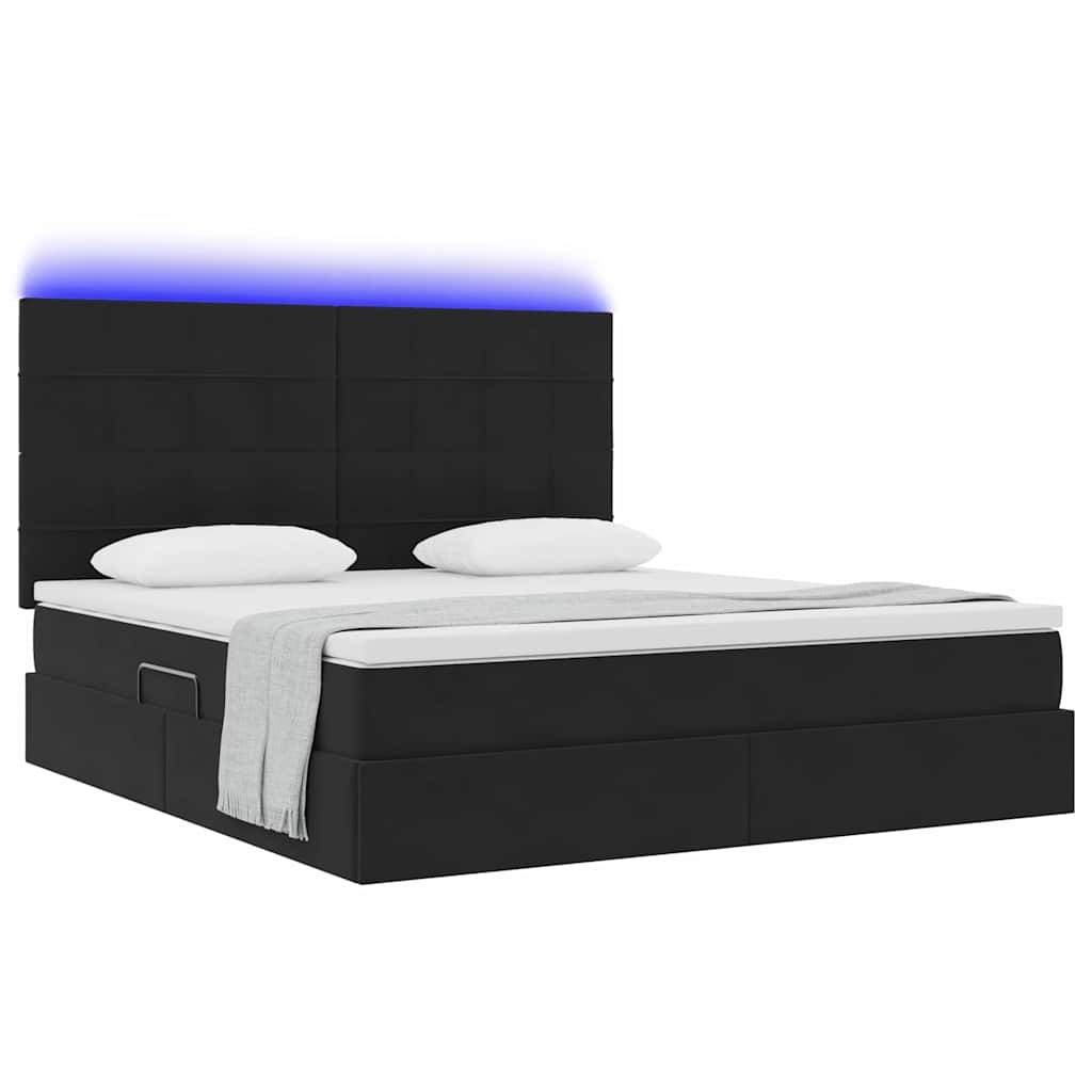 Ein modernes schwarzes Plattformbett mit einem hohen Kopfteil, das von einem subtilen blauen LED-Licht beleuchtet wird. Das Bett ist ordentlich mit weißer Bettwäsche gemacht.