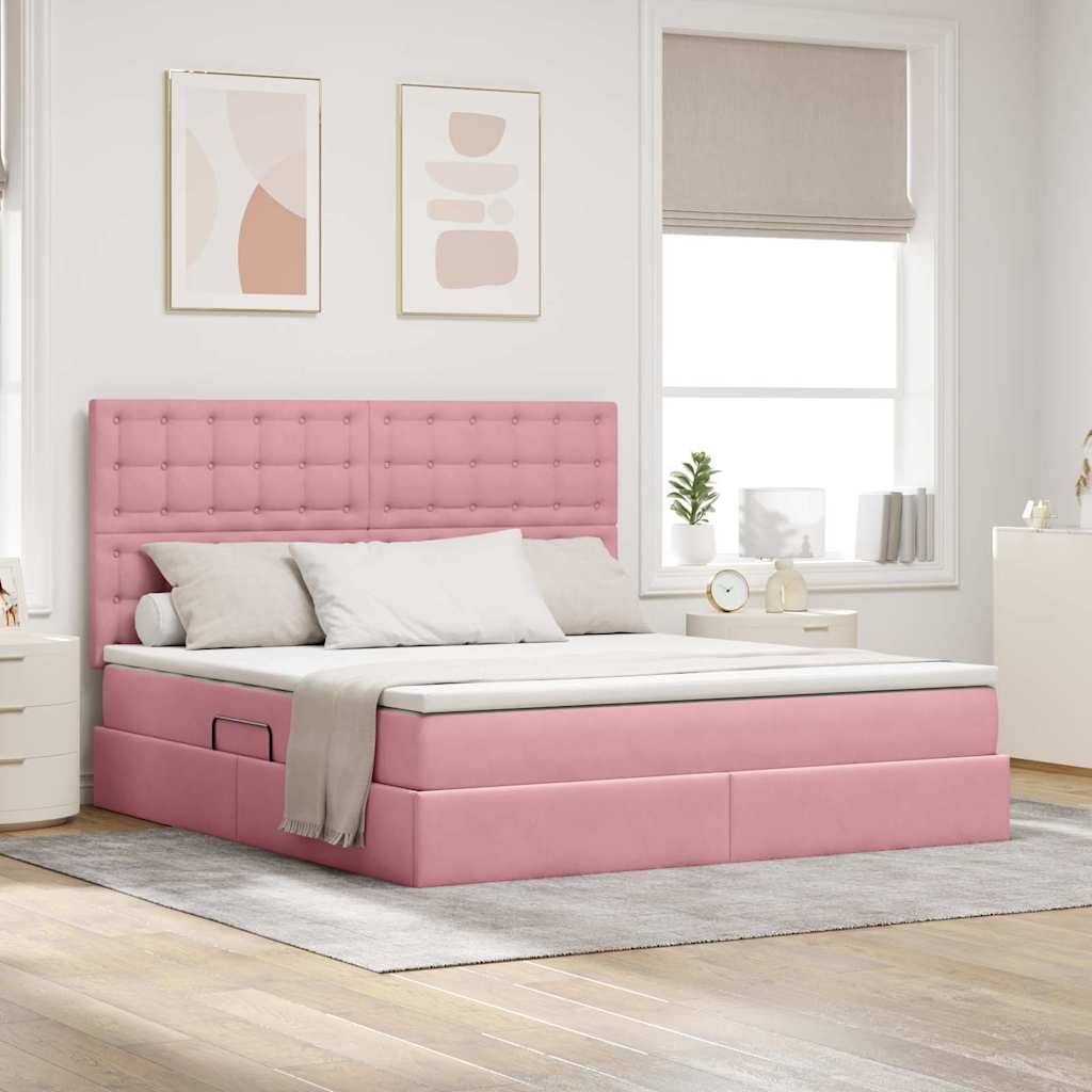 Ein modernes Schlafzimmer zeigt ein rosa gepolstertes Bett mit einer Schublade zur Aufbewahrung, neutrale Bettwäsche, abstrakte Kunstwerke und passende Nachttische.
