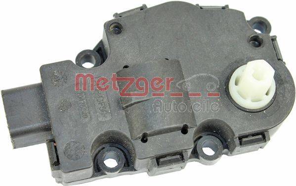 Autoteil mit der Beschriftung 'Metzger Autoteile', das eine mechanische Komponente mit einem kleinen Zahnrad zeigt.