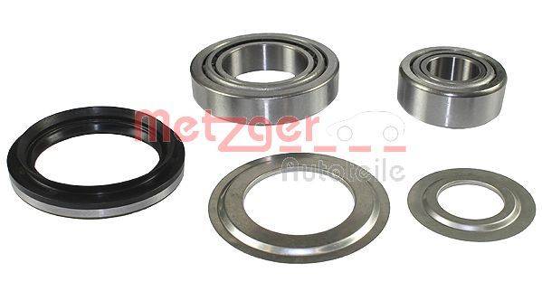 Lagerbausatz mit Metallringen, Gummidichtung und 'Metzger Autoteile' Branding im Hintergrund.