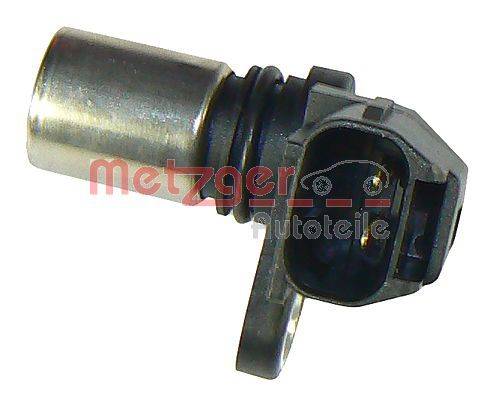 Ein Autosensor mit einem metallischen Gehäuse und einem schwarzen Kunststoffstecker. Die Worte 'Metzger Autoteile' sind auf dem Bild sichtbar.