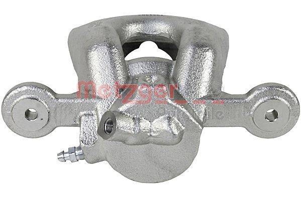 Eine metallische Bremssattel mit Bolzenöffnungen, entwickelt für Automobile-Bremssysteme. Seine robuste Konstruktion und Ausführung spiegeln Haltbarkeit wider.