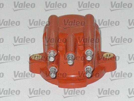 Verteilerkappe der Marke 'Valeo' mit Metallkontakten für Zündungssysteme von Kraftfahrzeugen, vor einem einfarbigen Hintergrund.