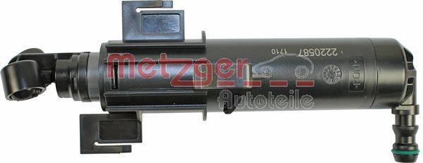 Eine Nahaufnahme eines Autoteils, möglicherweise einer Komponente eines Automobil-Systems. Der Hintergrund enthält Branding mit stilisiertem Text.
