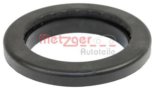 Ein schwarzer Gummidichtungsring mit dem Text 'Metzger Autoteile' in Rot und Grau, der wahrscheinlich eine Marke für Autoteile kennzeichnet.