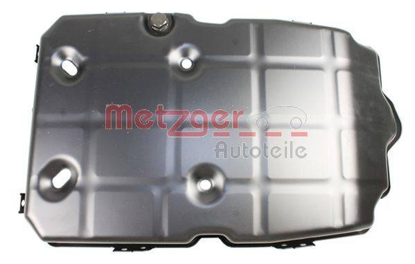 Ein metallisches Autoteil mit einer Gitternetzoberfläche und den Worten 'Metzger Autoteile', höchstwahrscheinlich eine Autokomponente.