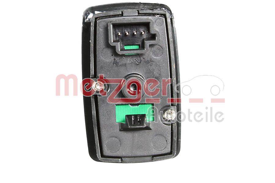 Ein schwarzer rechteckiger elektronischer Schalter mit einem grünen Anschluss, versehen mit zwei Schraublöchern auf beiden Seiten zur Montage. Er ist mit einem roten Logo versehen, das teilweise sichtbar ist.