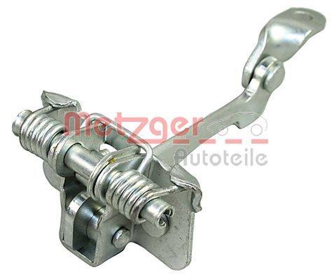 Ein Metalltürstopper mit Federn von Metzger Autoteile.