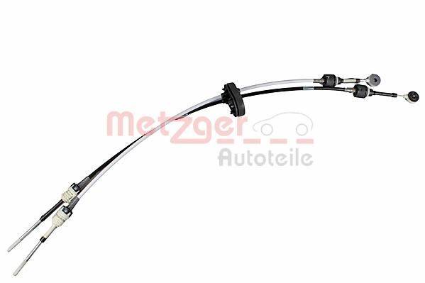 Ein gekrümmtes Automobil-Kabel, das mit 'Metzger Autoteile' beschriftet ist, das zur Einstellung oder Verbindung von Teilen in Fahrzeugen verwendet wird.