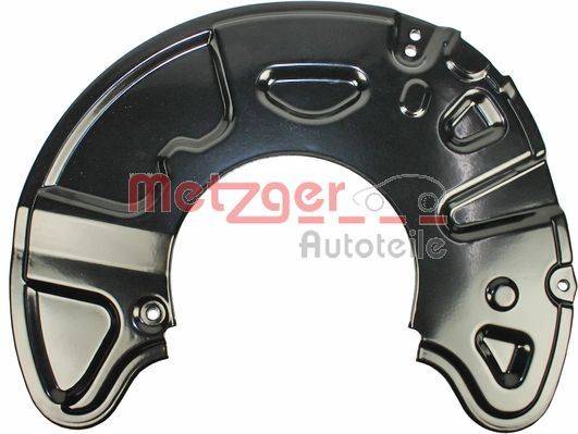 Ein metallischer Bremsscheibendeckel mit der Aufschrift 'Metzger Autoteile', der eine geschwungene Gestaltung und Befestigungslöcher aufweist und auf eine automotive Verwendung hinweist.