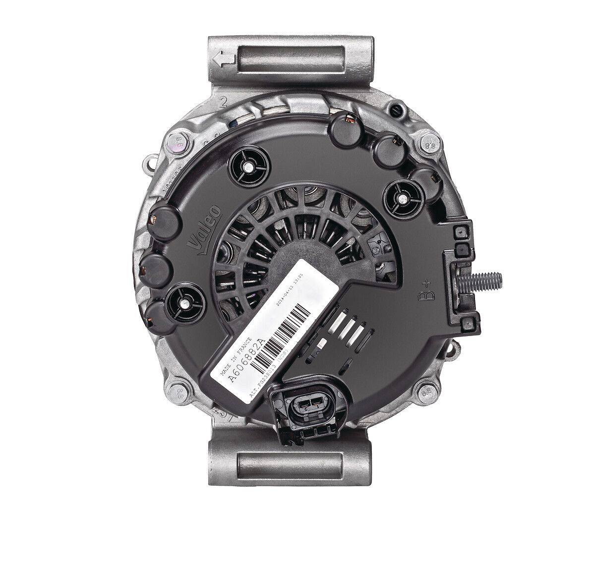 Ein Autolichtmaschinengehäuse aus Metall mit sichtbaren Befestigungshalterungen und Barcode-Etikett.