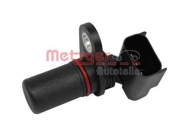 Ein schwarzer Autosensor mit einem roten O-Ring und einem Dreipol-Stecker. Text auf dem Bild lautet 