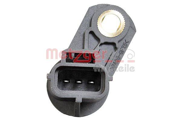 Ein Kunststoff-Autosensor mit einem Metalleinsatz und drei elektrischen Anschlüssen, beschriftet mit 'Metzger' und '125K', verwendet für Motormanagement.