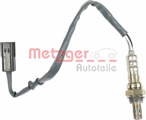 Ein Temperatursensor mit einem gewickelten, flexiblen Kabel und einem Metallstecker am Ende. Der Text 'Metzger Autoteile' ist sichtbar.