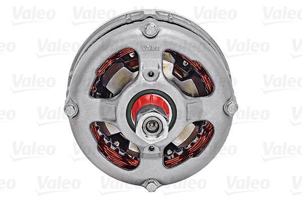 Draufsicht eines Autolichtmaschinengehäuses mit sichtbaren internen Kupferspulen und Rotoranordnung in einem metallischen Rahmen, mit der Marke 'Valeo' gekennzeichnet.