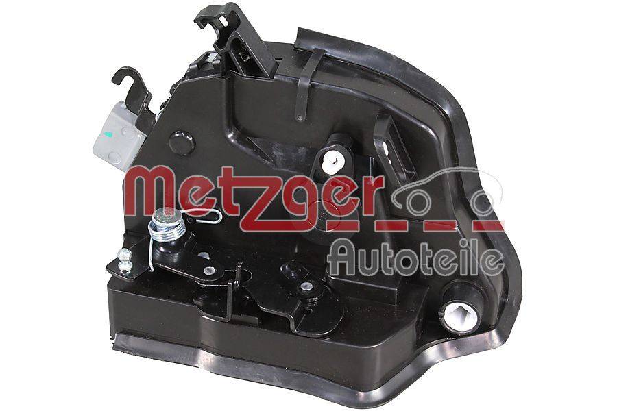 Ein Autotürschloss-Mechanismus mit verschiedenen Komponenten und Metallteilen. Die Worte 'Metzger Autoteile' sind auf dem Bild dargestellt.