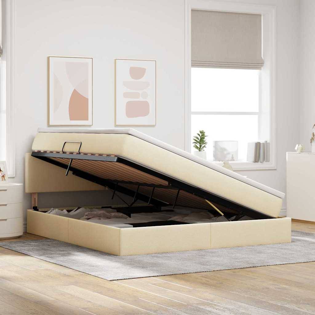 Ein beige farbenes Bett mit einem offenen Stauraum in einem hellen, modernen Schlafzimmer mit zwei abstrakten Gemälden und einem Fenster im Hintergrund.