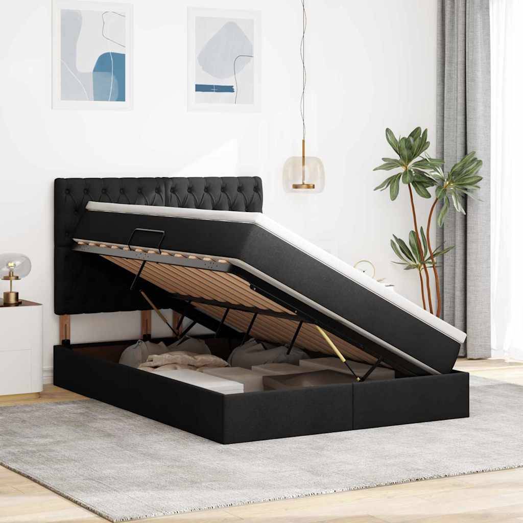 Ein Schlafzimmer mit einem schwarzen gepolsterten Bettkasten, der geöffnet ist und den Stauraum darunter offenlegt. Neutrale Dekoration mit gerahmter Kunst und einer Topfpflanze.