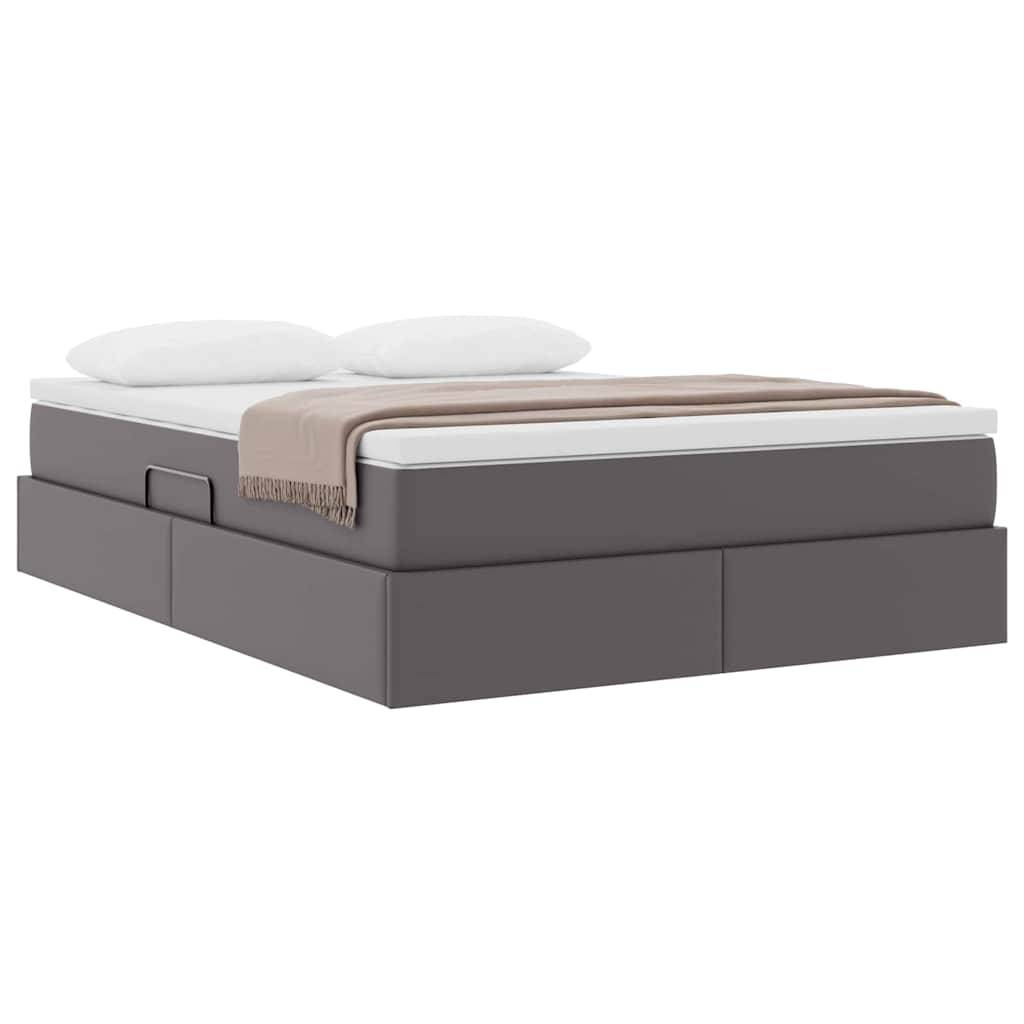 Ein modernes graues Plattformbett mit einer weißen Matratze und einer braunen Decke, ausgestattet mit integrierten Staurageschubladen an den Seiten.