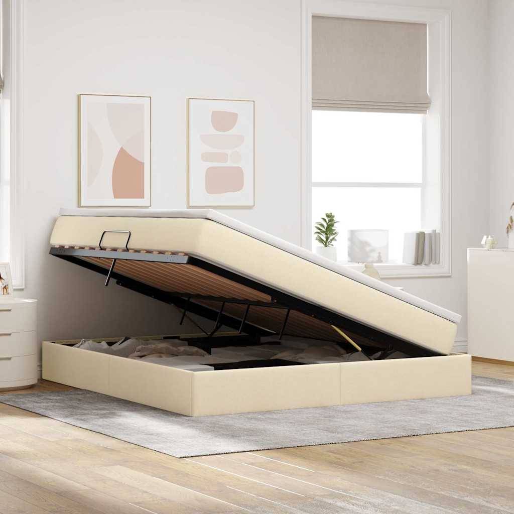 Ein beige-farbenes Bett mit einem offenen Stauraum darunter, in einem hellen Schlafzimmer mit abstrakter Wandkunst und zwei Fenstern mit Jalousien.