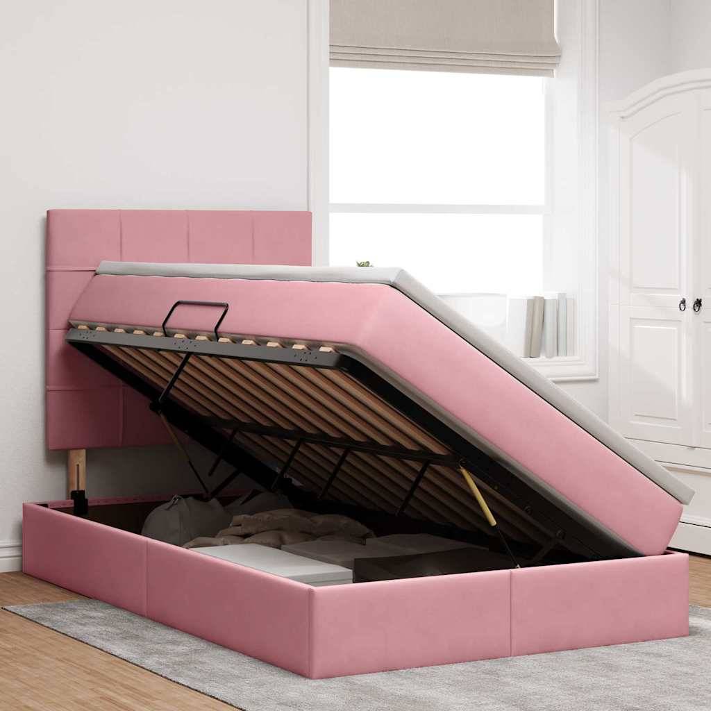 Rosa gepolstertes Bett mit hydraulischem Hebewerk enthüllt Stauraum darunter, installiert in einem modernen Schlafzimmer mit weißen Wänden und einem Fenster.