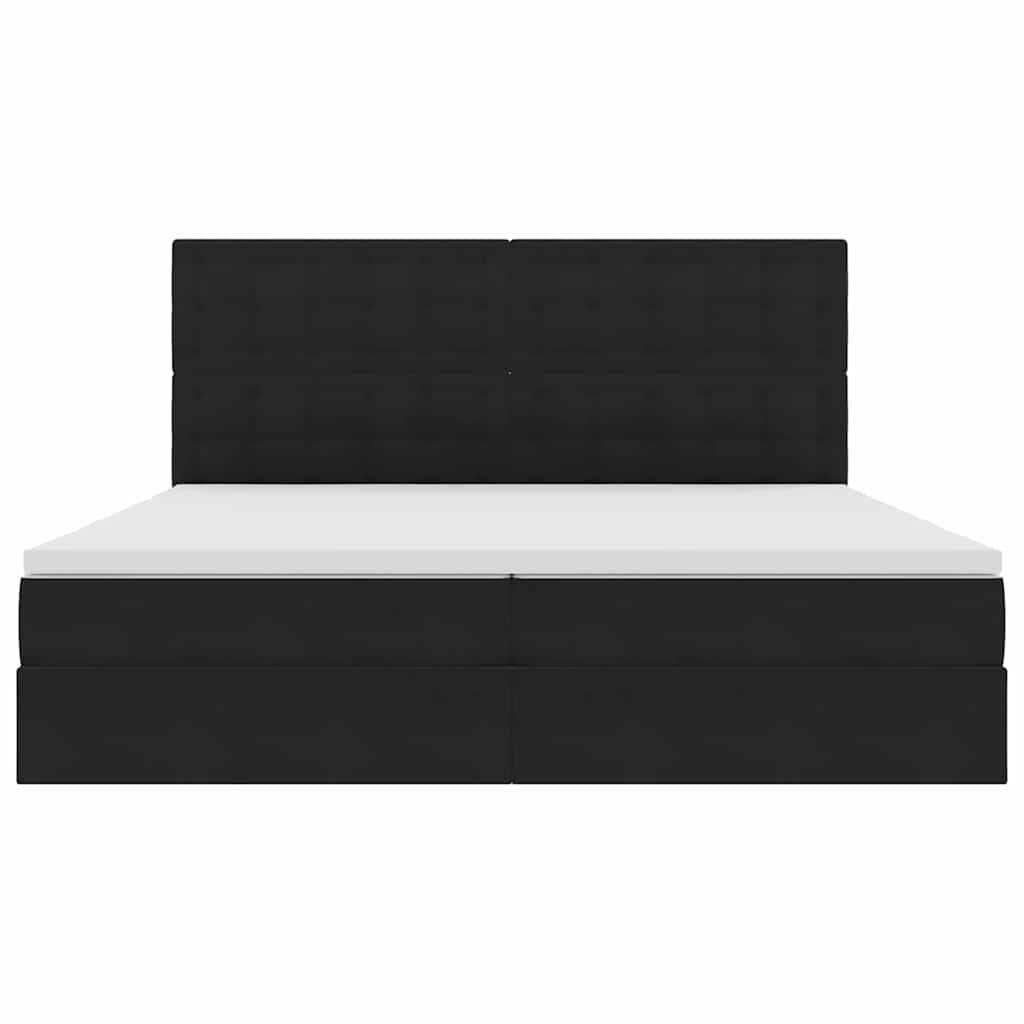 Ein modernes schwarzes Plattformbett mit einer weißen Matratze, das einen hohen, gepolsterten Kopfteil aufweist. Das Design ist minimalistisch und elegant.