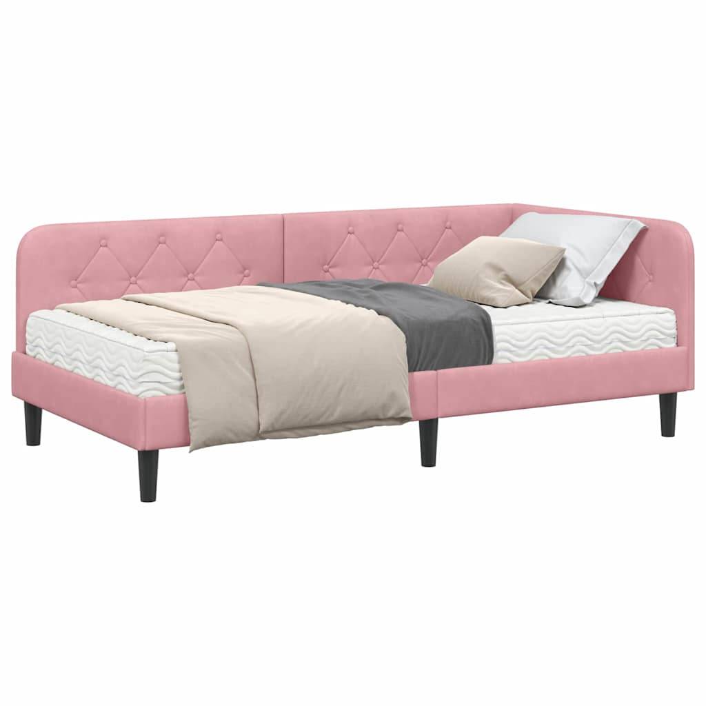 Ein rosa gepolstertes Bett mit gestepptem Kopfteil und schwarzen Beinen, ausgestattet mit einer ordentlich bezogenen Matratze und Bettwäsche sowie Kissen in Beige und Grau.