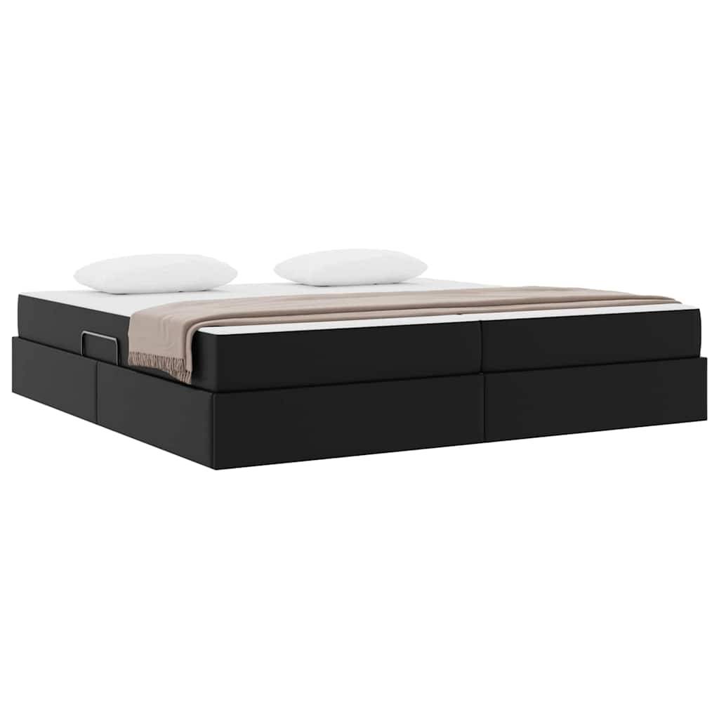 Ein modernes Bett mit niedrigem Profil, ausgestattet mit einem schwarzen Rahmen, versehen mit zwei weißen Kissen und einer beigen Bettdecke, der das minimalistische Design hervorhebt.