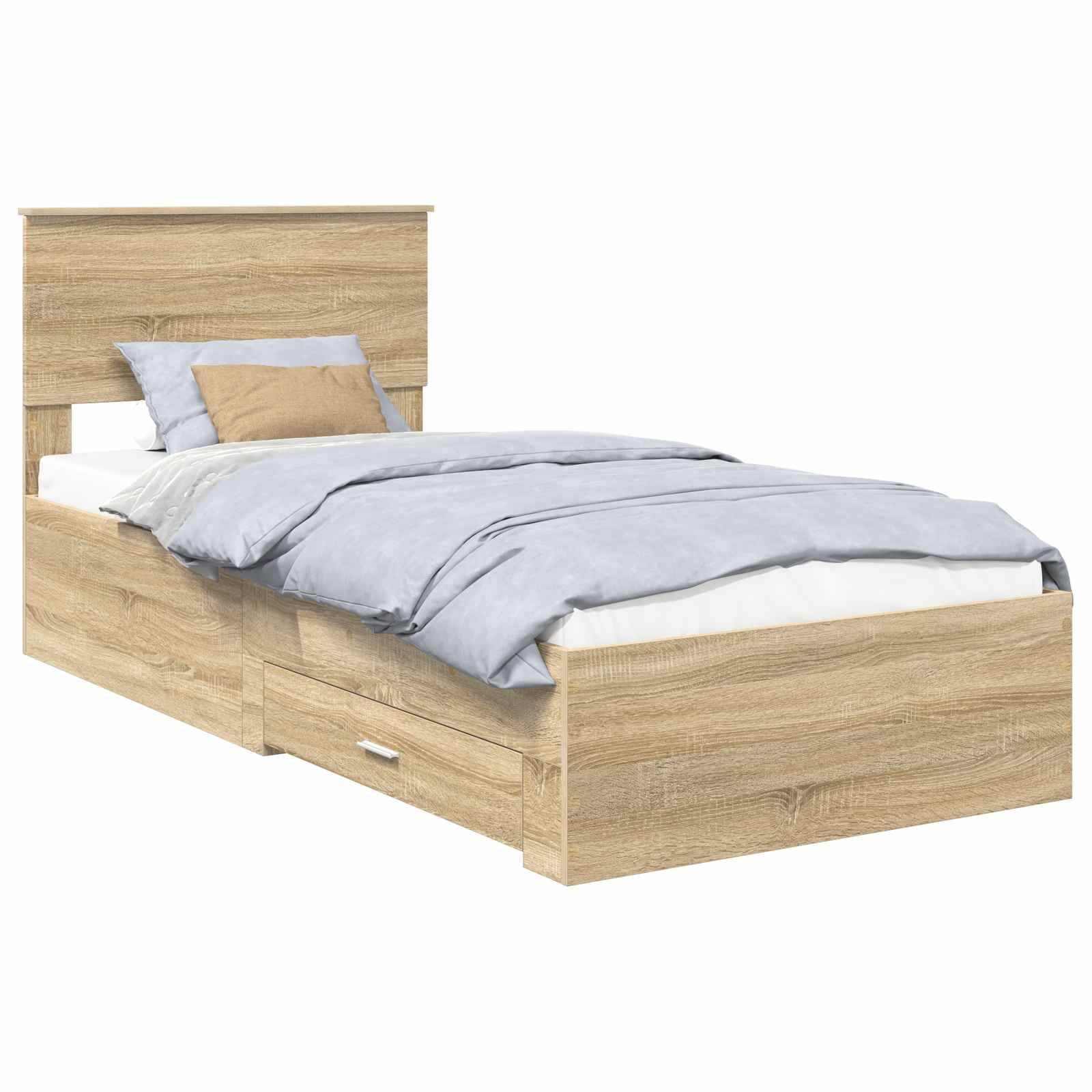 Ein Holz-Einzelbett mit einem Kopfteil und zwei Staurageschubladen darunter. Es ist ordentlich bezogen mit einer hellblauen Bettdecke und zwei Kissen.