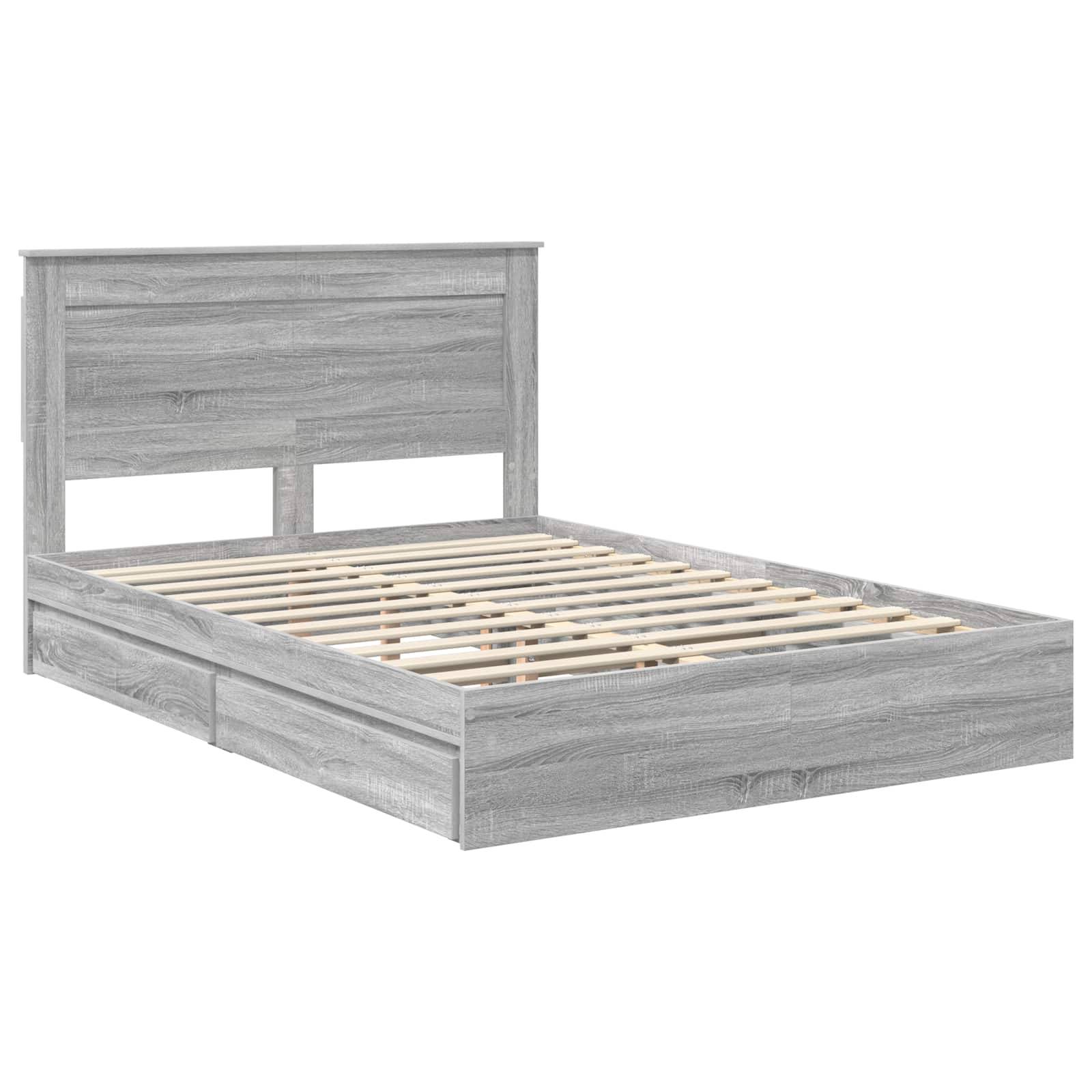 Ein grauer Holzbettrahmen mit hohem Kopfteil, Lattenrost und zwei Aufbewahrungsschubladen darunter.